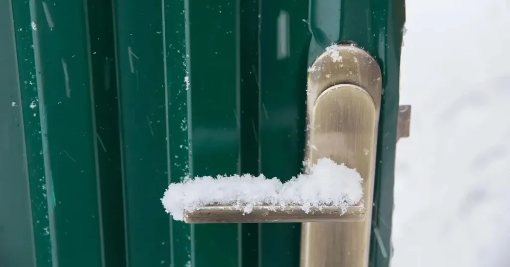 doors sticking in cold weather