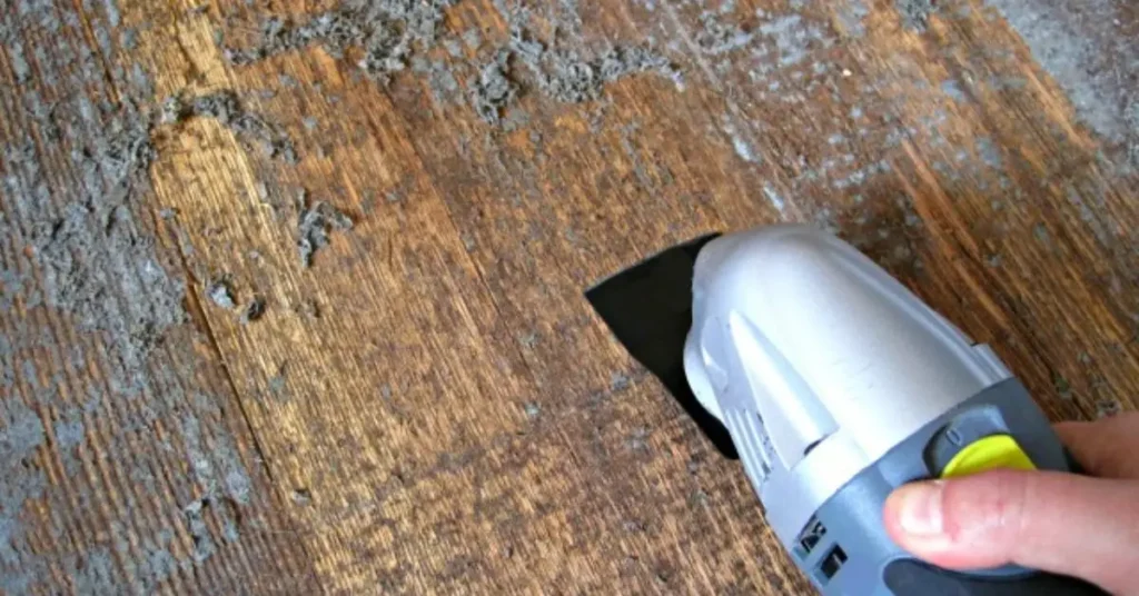 how to remove adhesive from wood floors without damage