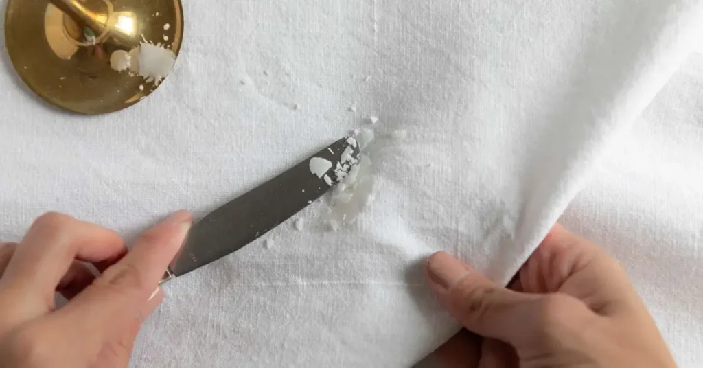 remove candle wax from fabric