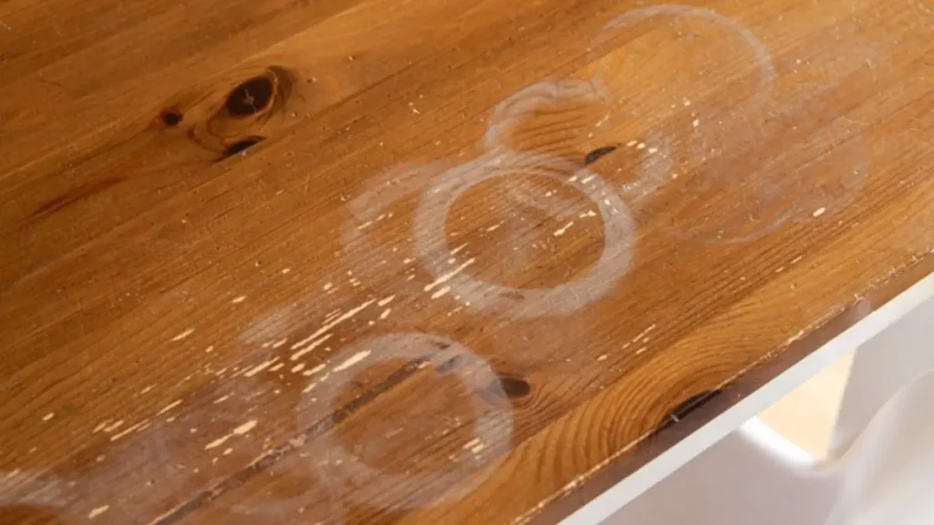 Use vaseline to remove water rings