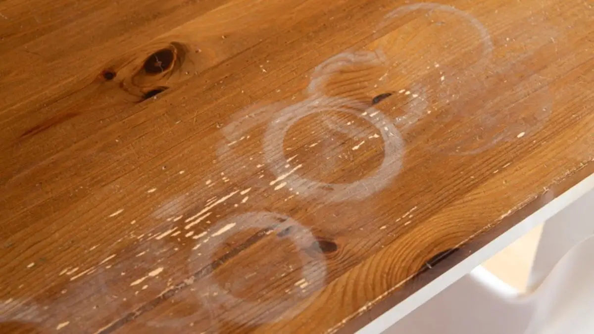 Use vaseline to remove water rings