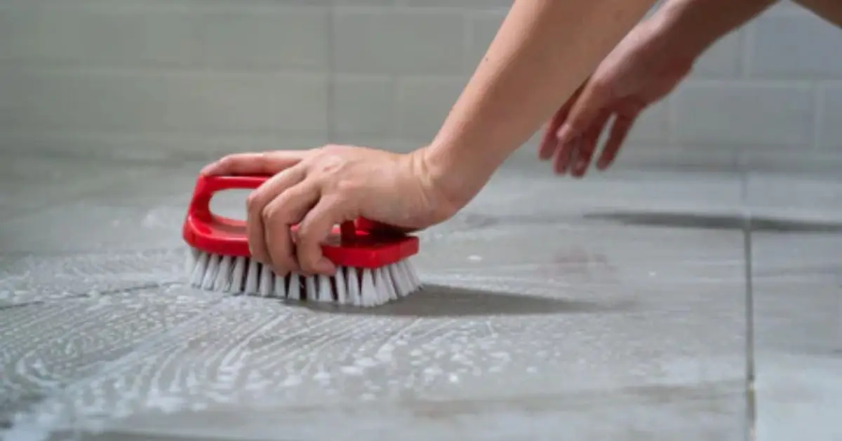 how to clean pebble shower floor