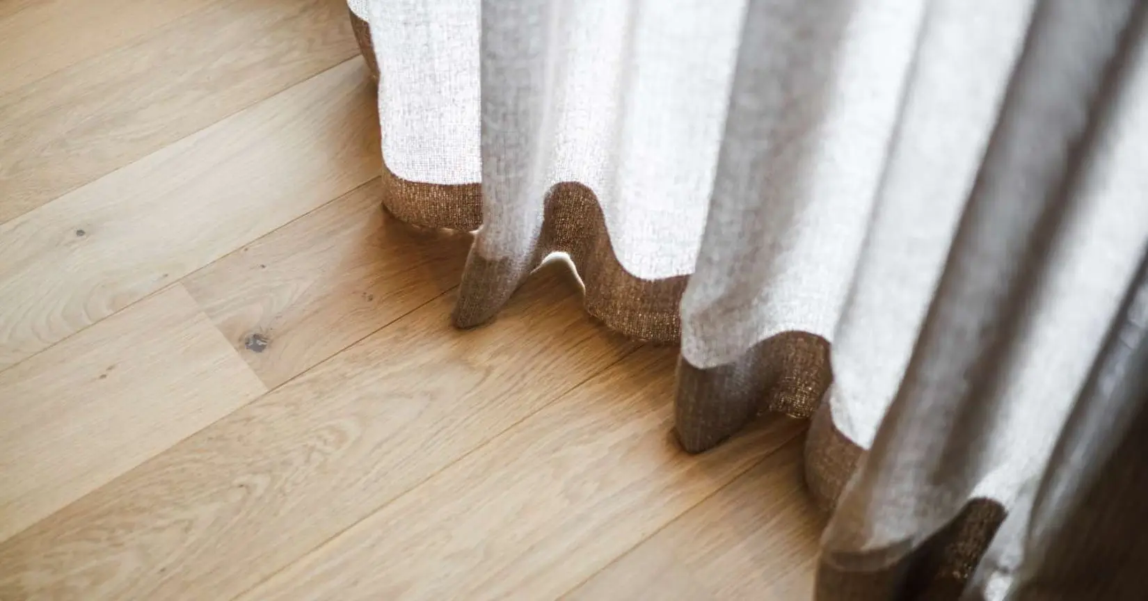 use drapery weights to make curtains look expensive