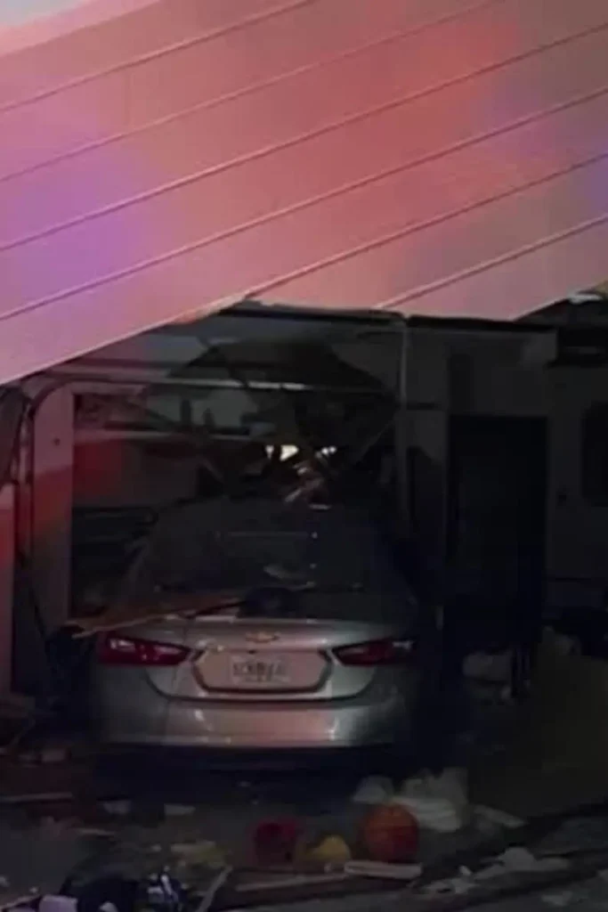 Car Crashes Into Garage in Villas Neighborhood