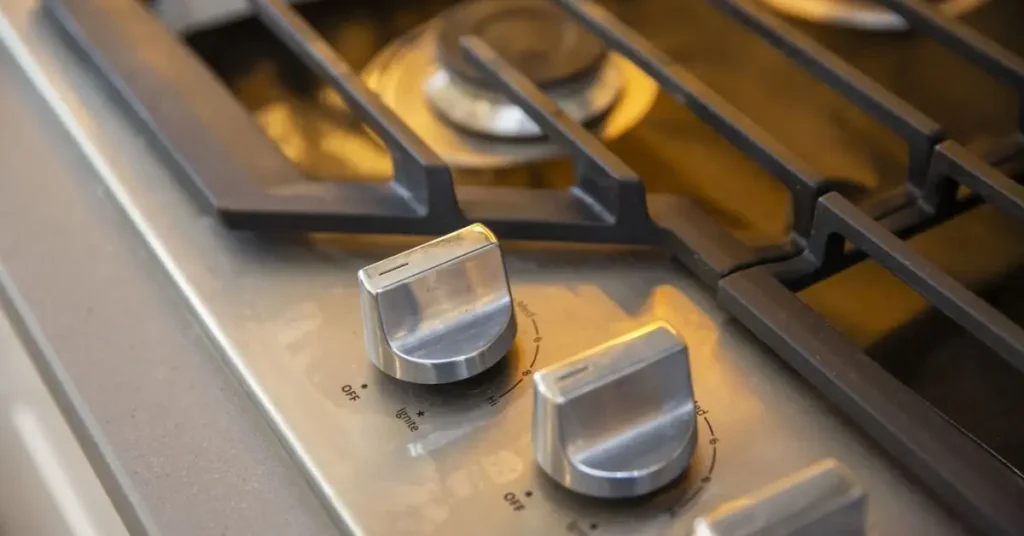 how to clean greasy stove knobs