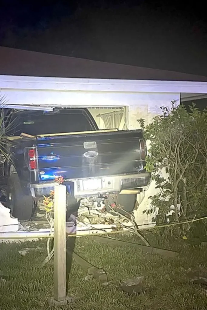 pickup truck crashes into Sarasota home