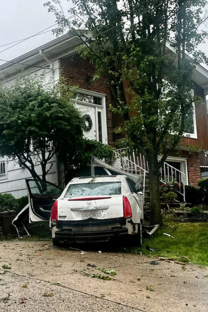 Car Slams Into Front Yard of Staten Island Home